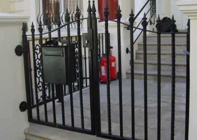 Entrance gate with letter box for a property in Swiss Cottage