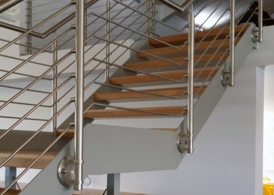 Stainless Steel staircase and balustrade with wooden cladding for Carey's PLC