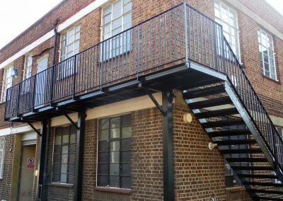 A functional fire escape by Porfan Metalwork. Full walkway and staircase designed in-house for a property in Wembley