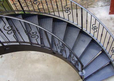 An elegant fire escape for the side of a residential property in Sheen. Combining function and form.