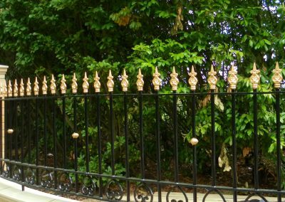 This beautiful railing surrounds a large residential property in Slough